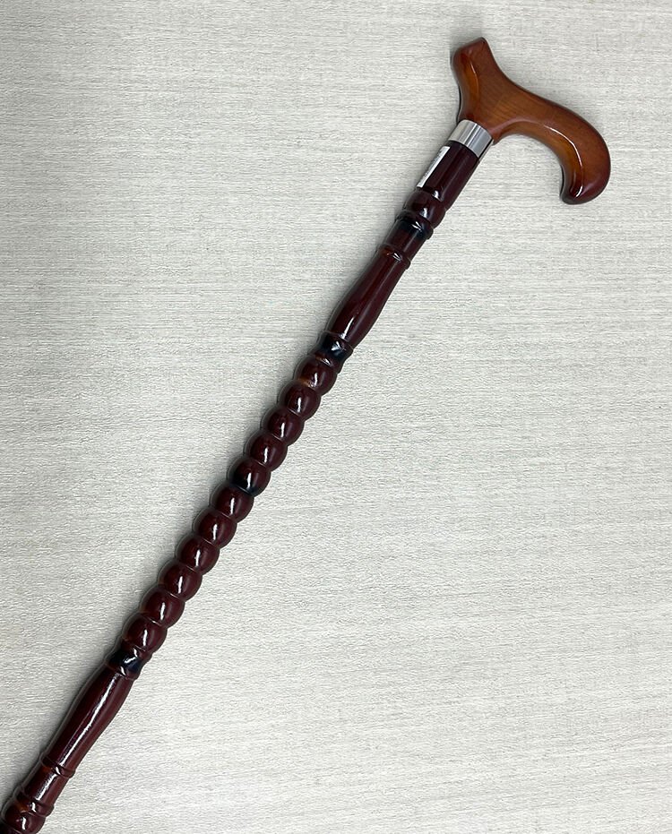 Rahat Tutuşlu Kahverengi Ahşap Baston Şık Tasarımlı Fonksiyonel Ürün